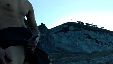 Horny Slim Brown Guy Jerks off Hard in a Heavenly Place Under the Sunset