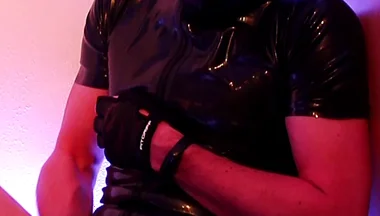 Rubber Slave Jerking off
