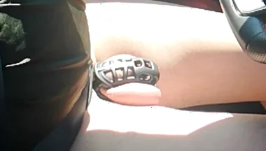 Small Penis in Cage While Driving in Pantyhose