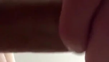 Masturbating