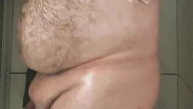 Fat Bear Taking a Shower