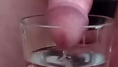 Cumming in a glass of hot water
