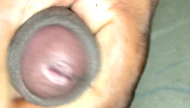 Masturbating
