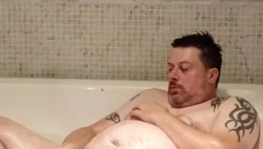 In the Big Bath Having a Wank