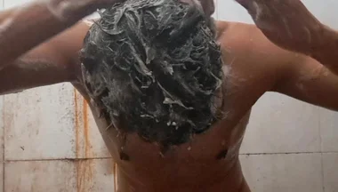 Exotic Skinned Adult Man Taking a Bath in the Afternoon