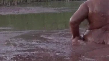 Mud Bath in Deep Quarry Mud Pond