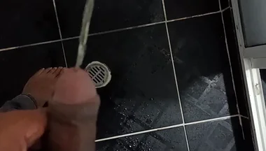 Urinating in Dark Jeans