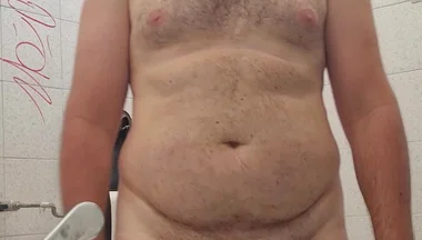 Completely Naked in a Station Bathroom