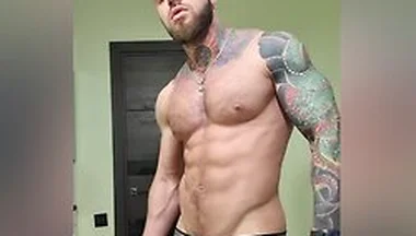 Bald Tattooed Jock Flex Muscles And Jerking