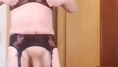 Andreas with suspender belt and bra jerking off