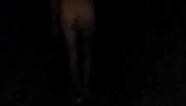 Naked Walking on the Hill Along Highway