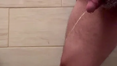 Man Pee in Bathroom