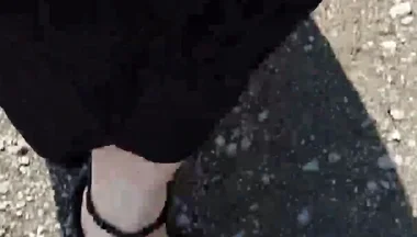 Outdoor in a Black Caftan and Barefoot in Black Birkenstocks