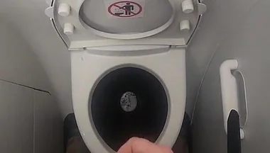 Airplane Bathroom Jerk and Cum.