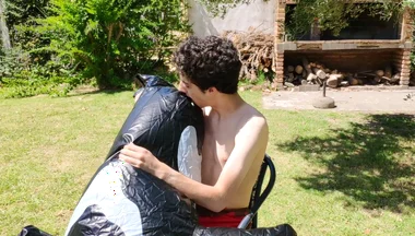 Beautiful Man Inflates His Inflatable Whale Near Pool Outside