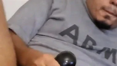 Browndicksavior Using His Oral Sex Toy and Stroking His Brown Cock