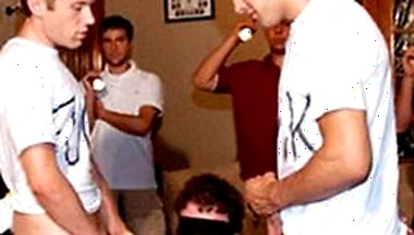 At A Wild Frat Party, A Daring College Stud Takes On A Cheering Crowd