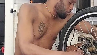 Kennie Jai Does a Nude Bike Repair. Watch That Big Dick Swing!
