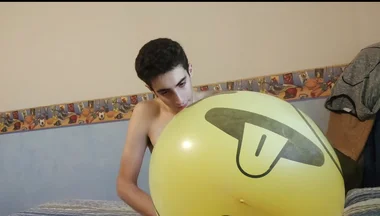 Blowing up a Huge Smiley Balloon While Jerking off
