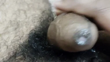 Masturbating