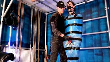 Twink Slave Bound in Pallet Wrap for Orgasm Control