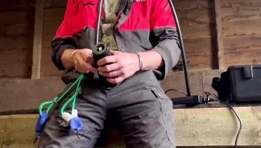 Farmer Smokes and Milks Himself with the Milking Machine