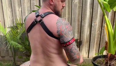 Stud Rides Dildos in the Backyard