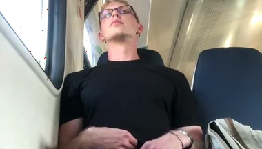 A Guy Is Jerking off on a Commuter Train