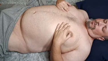 Chubby Guy Lays on Floor and Cums