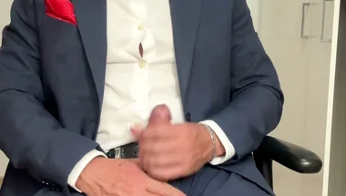 I Masturbate While Wearing a Suit and a Red Tie.