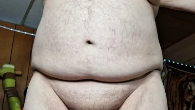 Chubby Guy Strips and Cums