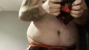 Anal Crossdressers Cuffed Cock and Ball with Pierced Nipples