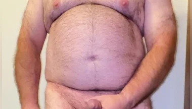 Anal Steve in His Blue Thong Showing off His Bear Body and Cock, with a Cock Ring on and Showing His Massive Butt Plug