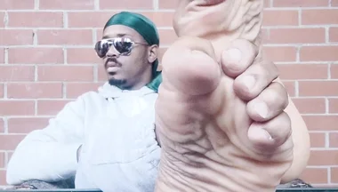 I Expose My Feet and I Touch Them
