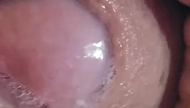 Close-up of Glans Ejaculating Intensely Before Cumming.