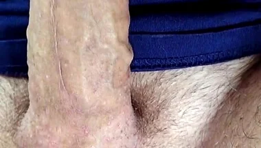 Close-up of Balls Tightening with Red Suction Vibrator